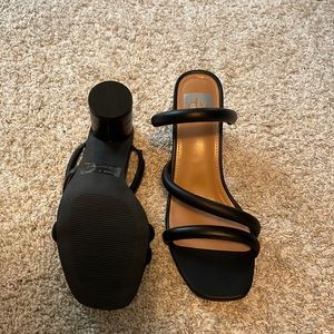 New, unworn, but no box or tags. Black women’s strappy sandal